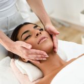 woman-receiving-head-massage-in-spa-wellness-J9S8GXE-1.jpg
